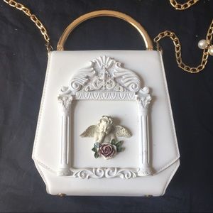 ❌SOLD❌cherub frame purse